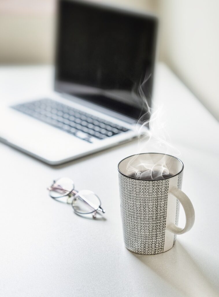desk, tea, coffee cup, coffee, table, laptop, cup, tea cup, mug, workplace